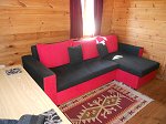 Holiday cabin lounge with corner sofa