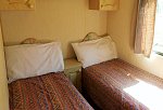 Standard caravan twin bedroom