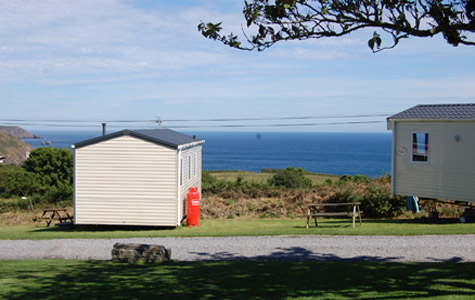 Caravans and sea view from the park